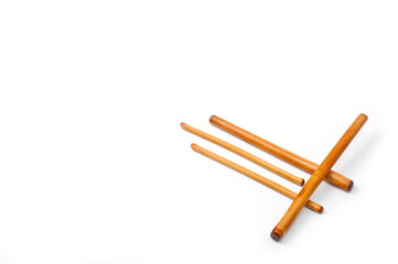 Four bamboo sticks to massage the face and other parts of the body.