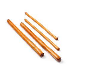 Four bamboo sticks to massage the face and other parts of the body.