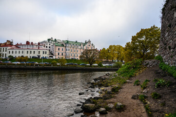 Fototapeta premium fortress wall. Vyborg Castle. Sightseeing. autumn day, yellow leaves.