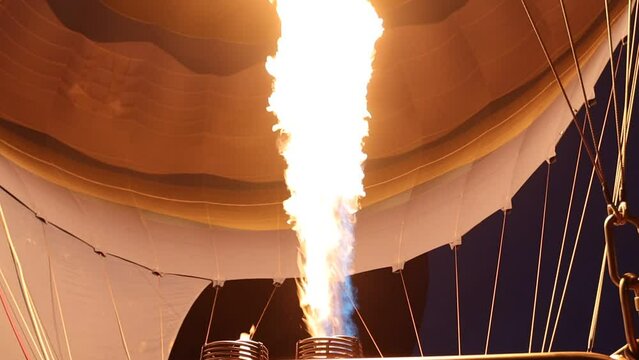 Flame inflating hot air balloon