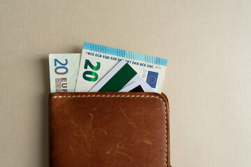 Money and credit cards in the dockholder.