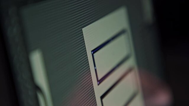 Freelancer, remote graphic designer draws on a computer prototype of a website, layout, app icon design for a smartphone, UI UX design. NFT product for sale on the exchange