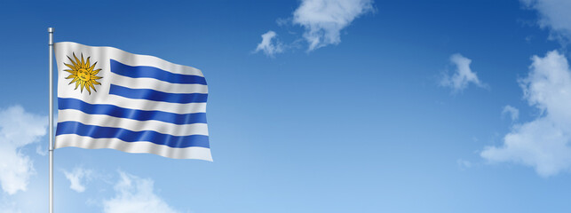 Uruguaian flag isolated on a blue sky. Horizontal banner