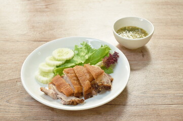 fried crispy slice pork leg with vegetable dipping spicy sauce