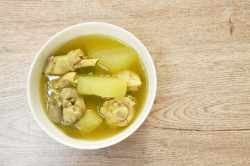 spicy boiled winter melon with chicken meat and liver in herb soup on bowl