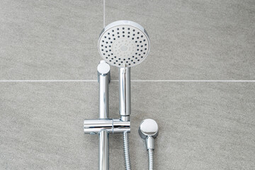 Silver shower head closeup in bathroom - obrazy, fototapety, plakaty