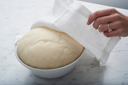 bread dough with female hand