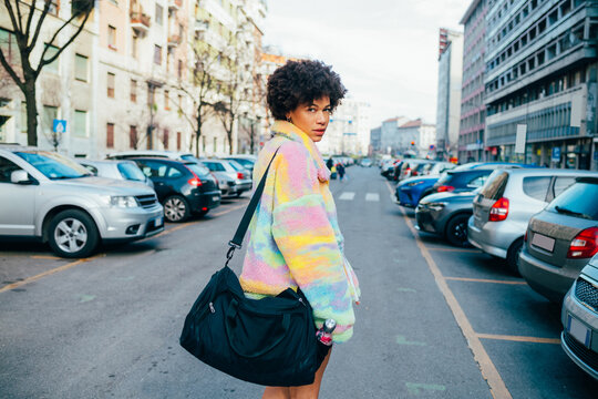 Sportive Black Young Woman Walking Outdoor Holding Duffel Bag Going Gym