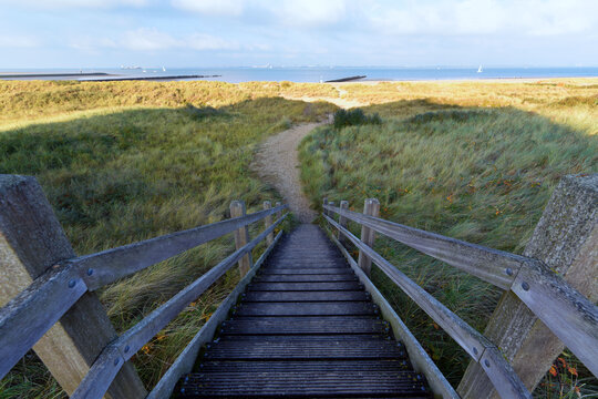 Wooden stairs going down into the sea in Breskens, Netherlands