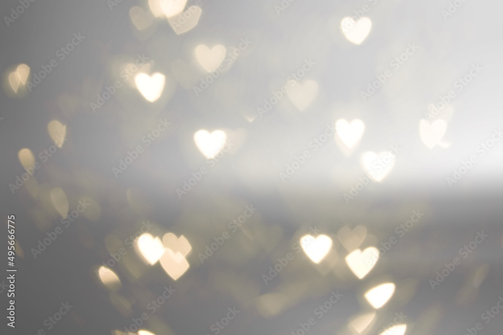 Sticker Valentine background with pink heart shaped light bokeh