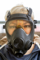 Portrait of a woman in a gas mask without filter