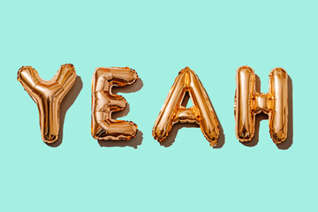 letter-shaped balloons forming the word yeah