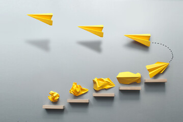 Paper airplane success concept