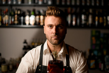 portrait of caucasian fair-haired man with beard and blue eyes