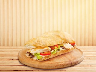 Grilled toasted sandwich with Cheese and chicken meat.