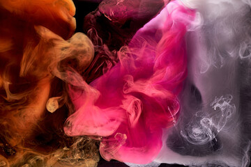 Orange pink smoke on black ink background, colorful fog, abstract swirling touch ocean sea, acrylic paint pigment underwater