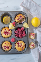 sweet vanilla raspberry muffins on a table