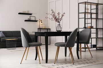 Beautiful dining room interior with new stylish furniture