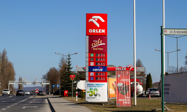 Orlen and Stop Cafe Bistro sign outside a petrol station. Logo at filling gas station forecourt with prices displayed on a pylon on March 21, 2022 in Krzeszowice, Poland.