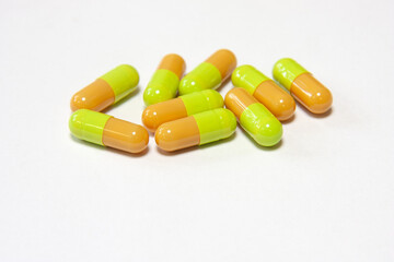 medicinal pills and capsules in blisters close-up. macro shooting of multicolored pills of different sizes