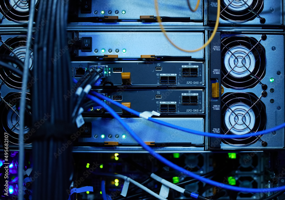 Poster Your data is on its way. Shot of electronic equipment in an empty server room.