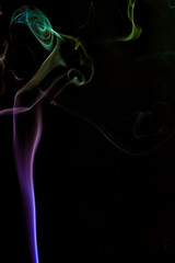 Abstract colorful smoke-like illustration isolated on a black background