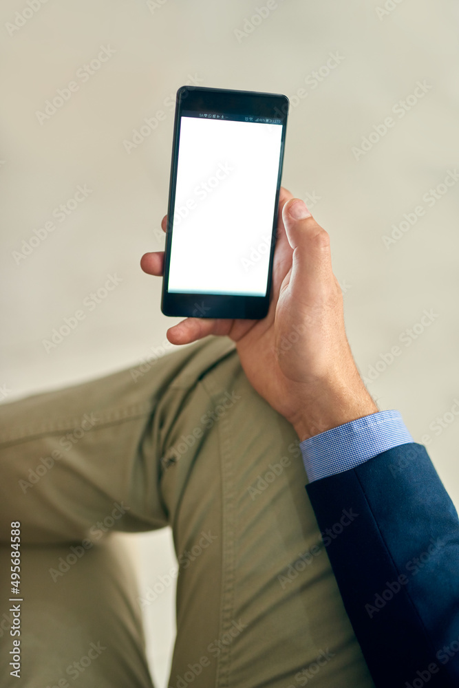 Leinwandbilder All the data he needs to get things done. Cropped shot of a businessman using a mobile phone in an office.