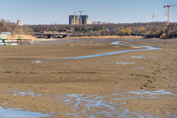 dried-up riverbed within city limits