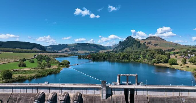 Panoramic aerial flies over Whakamaru dam and lake on a superb summer day-NZ