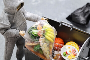 don't waste food, world food day concept image made in miniature.