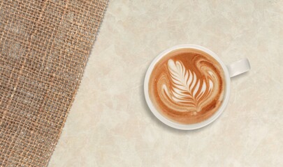 Espresso or black coffee in white cup on wooden desk