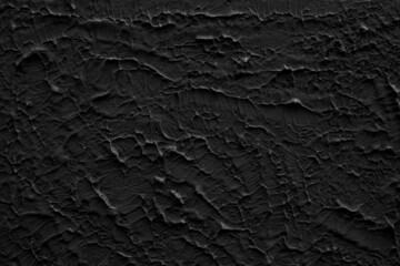 Painted wall with coarse texture, rough texture closeup. Black plaster with brushed texture, house wall, 3d background, copy space