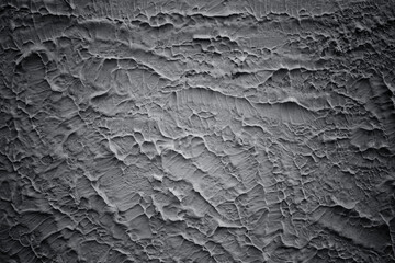 Painted wall with coarse texture, rough texture closeup. Black plaster with brushed texture, house wall, 3d background, copy space. Background vignette