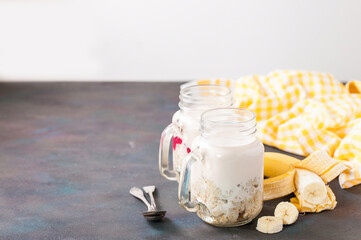 Healthy breakfast - porridge and yogurt in a jar. Selective focus. Copy space