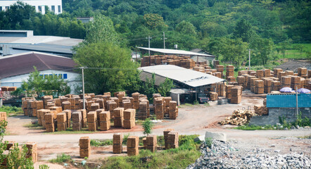 Fototapeta na wymiar Large group of timber outside warehouse