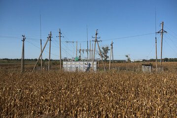 Transformers - electrical substation on an agricultural field.