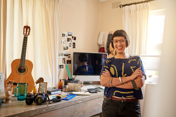 She brings her creativity to life here. Portrait of a stylish young designer standing in her...