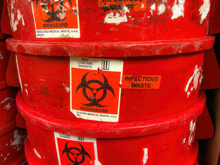 Closeup shot of an infectious waste red barrel
