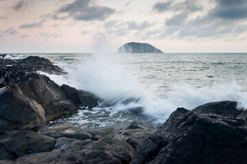 Sunset on the rocky shore.