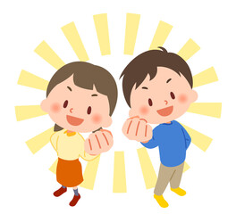 ガッツポーズをする小学生