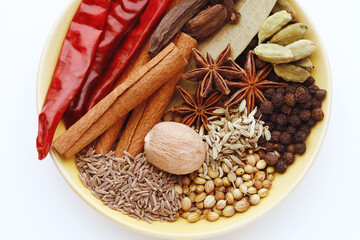 Fototapeta na wymiar Spices and herbs in bowl. Food and cuisine ingredients. Colorful natural additives.