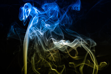 Concept of abstract smoke colored with the colors of the Ukrainian flag