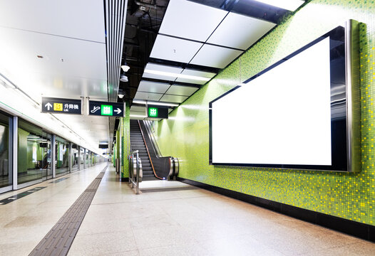 Blank billboard in subway station of city