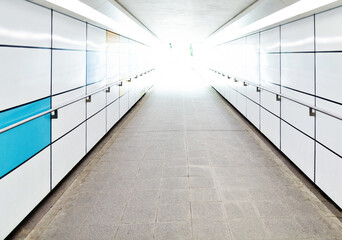 Empty long corridor with railing
