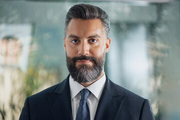 Fototapeta premium happy young businessman posing in a modern office 