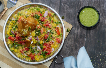 Samosa Ragda is a popular Indian Street food variation made with hot and crispy Aloo Samosa topped with tangy spicy chutneys and ragda