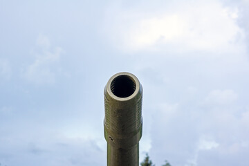 Tank gun barrel. Military background.