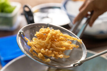 Deep fried crispy enoki mushroom. Enoki mushroom with crispy fried flour. Vegan food style. 