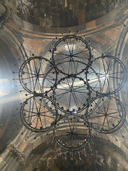 View on an ancient church chandelier  from below