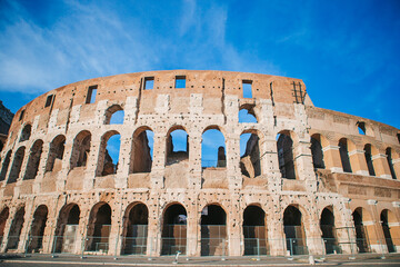 Obraz premium Colosseum background blue sky in Rome, Italy